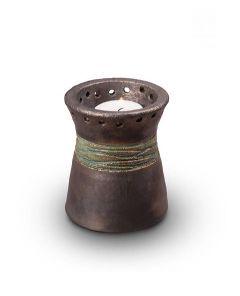 Ceramic keepsake with a candle holder