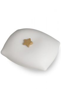 White pillow urn for ashes with golden star